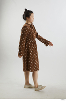    Aera  1 brown dots dress casual dressed side view walking white oxford shoes whole body 0001.jpg